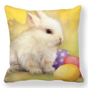 Close-up of Easter peach skin pillowcase with a white bunny and colorful eggs pattern