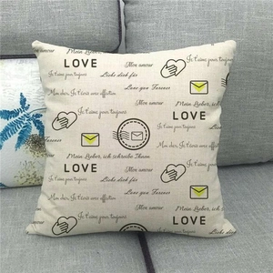 Detailed texture of linen throw pillow case featuring romantic hand-drawn heart patterns