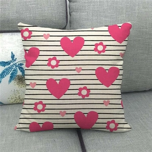 Detailed macro view of linen fabric texture with black stripes and pink heart patterns