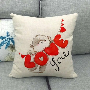 Linen square throw pillow cover featuring cartoon bears and LOVE print on a sofa