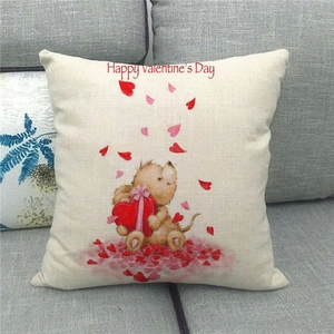 Detail of linen pillow cover featuring a cute animal holding a heart for Valentine's Day