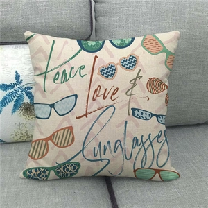 Detailed texture of linen throw pillow cover with Peace Love & Sunglasses print