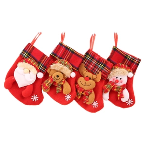 Set of 4 Christmas stockings with plush Santa, bear, reindeer, and snowman dolls