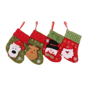Set of four Christmas stockings featuring 3D Santa, Snowman, Reindeer and Polar Bear patterns