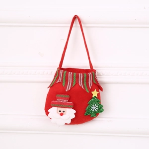 Detail of Christmas gift bag with 3D Santa and sequined green tree decoration