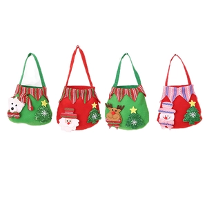 Set of four Christmas fabric gift bags featuring Santa, Reindeer, Snowman, and Polar Bear