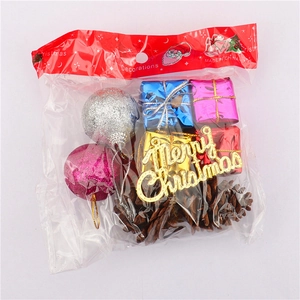 Assorted Christmas ornaments set with glitter balls, mini gift boxes, and pine cones