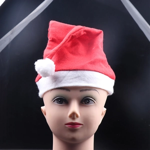 Detailed view of classic red and white Christmas hat with soft plush trim on mannequin head
