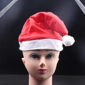 Detailed view of a classic red and white plush Christmas hat on a display mannequin head