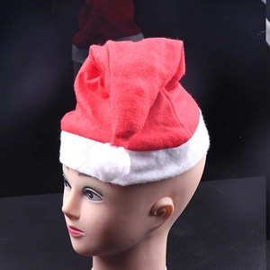 Close-up of red and white Santa hat on a mannequin head with soft white plush trim
