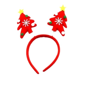 Christmas headband with red antlers and decorative green trees on a white background