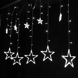LED star curtain lights with hanging glowing hollow stars for holiday window decor