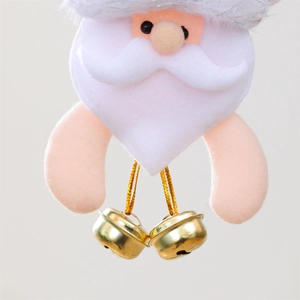Macro detail of felt Santa Claus ornament with curly beard and dual gold metal bells