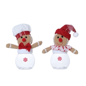 Mini Christmas gingerbread man candy jars with festive hats and transparent round bodies