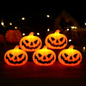 Lot de 5 lanternes citrouilles LED orange d'Halloween avec visages lumineux pour la fête