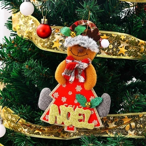Christmas reindeer hanging ornament with Noel glitter text on a festive holiday tree