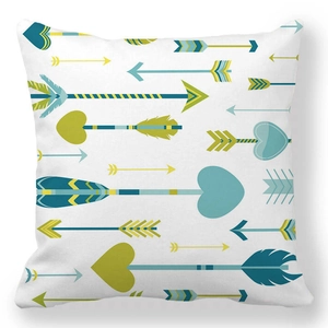 Detail of soft peach skin pillowcase featuring modern teal and lime green arrow patterns