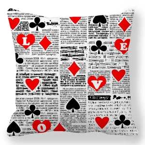 Vintage newspaper style square throw pillow with LOVE letters and poker suits print