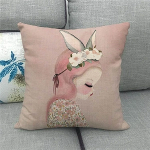 Detailed texture of linen cushion cover featuring hand-painted girl with bunny ears