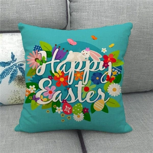 Close-up of Happy Easter linen pillowcase with white rabbit and colorful eggs on blue
