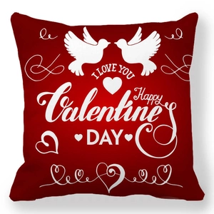 Detail of red Valentine's Day pillowcase with white doves, hearts, and I Love You text