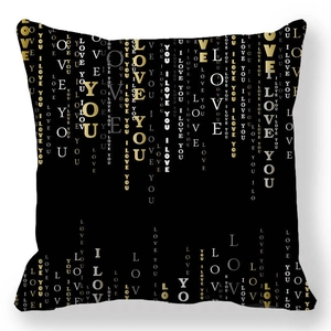 Detail of black linen pillowcase with gold and white I LOVE YOU vertical typography print