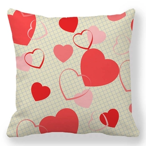 Detail of square pillowcase with red heart patterns on blue grid peach skin fabric