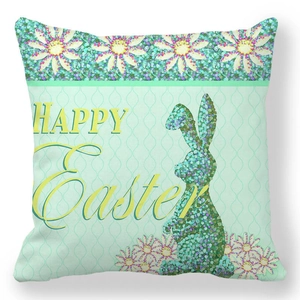 Close-up of mint green Easter pillow case with Happy Easter text and rabbit silhouette