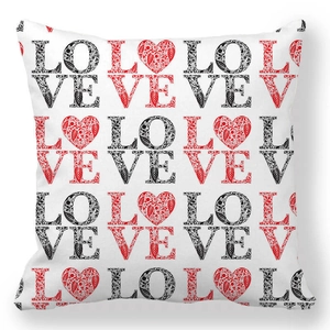 Detail of Valentines pillowcase with LOVE letters and red heart floral pattern