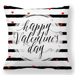 Detail view of peach skin fabric pillowcase with stripes and happy Valentine's day print