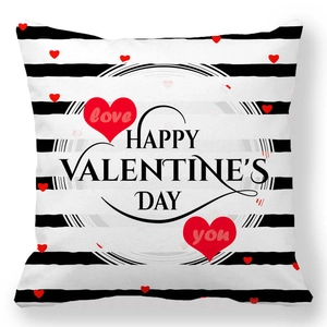 Detail of Happy Valentine's Day heart pattern on black and white striped pillow case