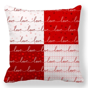 Detail of red and white checkered peach skin pillowcase with heart motifs and Love text