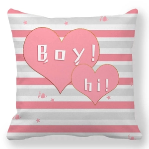 Macro detail of striped cushion cover featuring pink hearts and Boy text embroidery