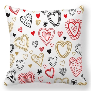 Close-up of white peach skin pillowcase with red and gold heart patterns for Valentine's Day