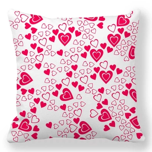 Detail view of heart pattern print on white square cushion cover for Valentine's Day