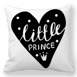 Detail of white peach skin cushion cover with black Little Prince heart pattern