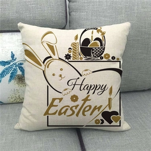 Close-up of Happy Easter linen pillowcase featuring a bunny and eggs on a sofa