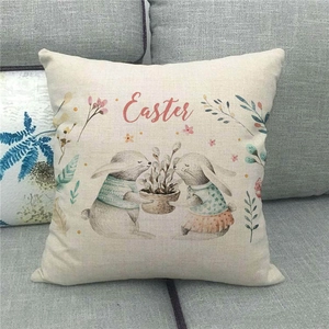 Detalle de ilustración de conejos y texto de Pascua en funda de cojín de lino