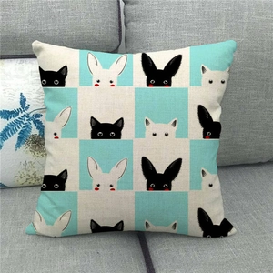 Easter flax pillowcase with cute checkered cartoon cat and rabbit patterns on a sofa