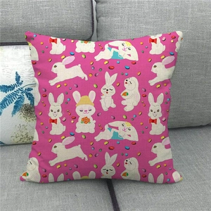 Detailed texture of pink linen Easter pillowcase with cartoon rabbit patterns on grey sofa