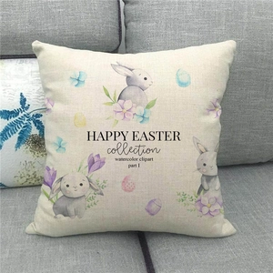 Detail of linen Easter pillowcase with watercolor rabbit and floral pattern on sofa