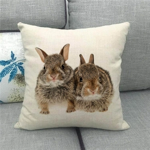 Detailed close-up showing the natural linen fabric texture of a rabbit pattern pillowcase
