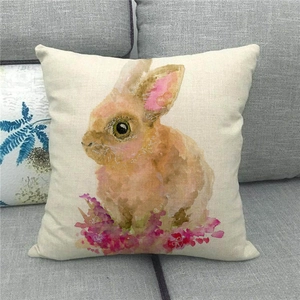 Detailed texture of linen pillowcase with watercolor Easter bunny and floral print