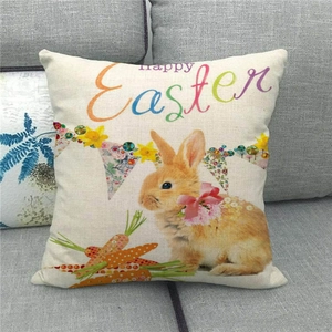 Funda de cojín de Pascua en lino con diseño de conejo en sofá gris