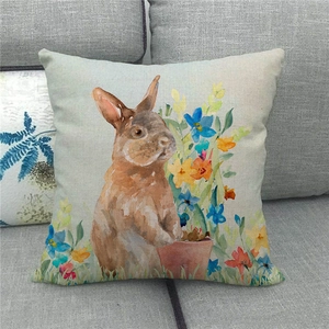 Detailed macro view of linen pillowcase featuring watercolor Easter bunny and wildflowers