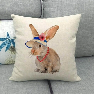 Detailed view of linen pillowcase with watercolor bunny wearing a floral sun hat