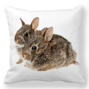 Detailed view of realistic brown rabbits print on white peach skin fabric cushion cover