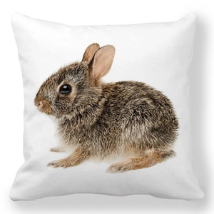 Detail of square pillowcase with realistic bunny rabbit print on peach skin fabric
