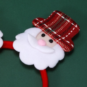 Close-up of Santa Claus headband with red plaid hat and white felt beard for party decor