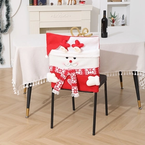 Christmas reindeer chair cover with plush antlers and scarf for festive dining decor